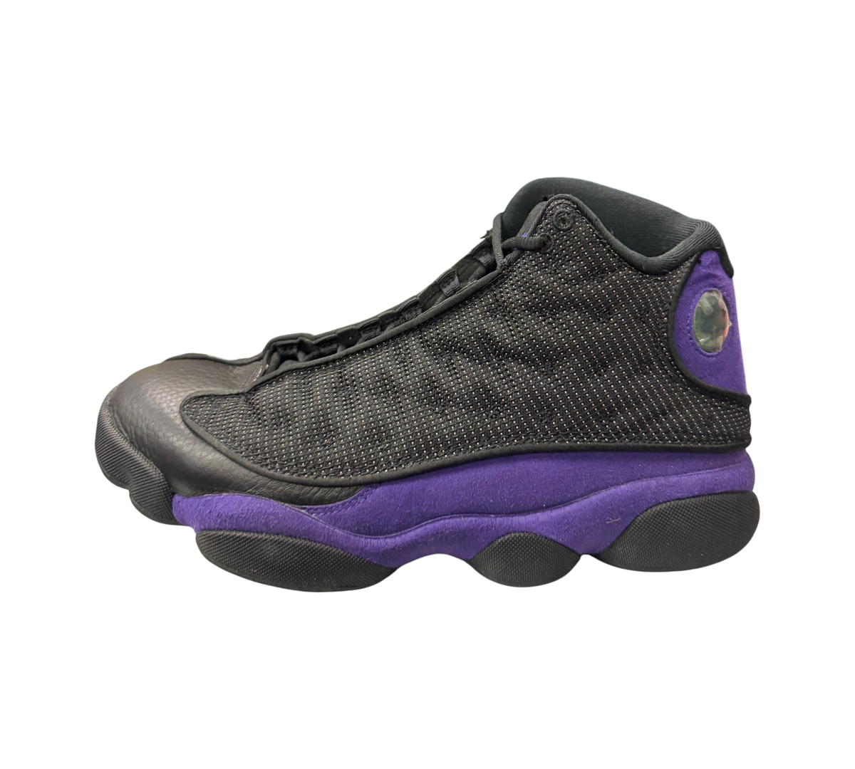 Genesis Boutique Jordan 13 Court Purple sneakers featuring black leather and mesh upper with vibrant purple suede accents.