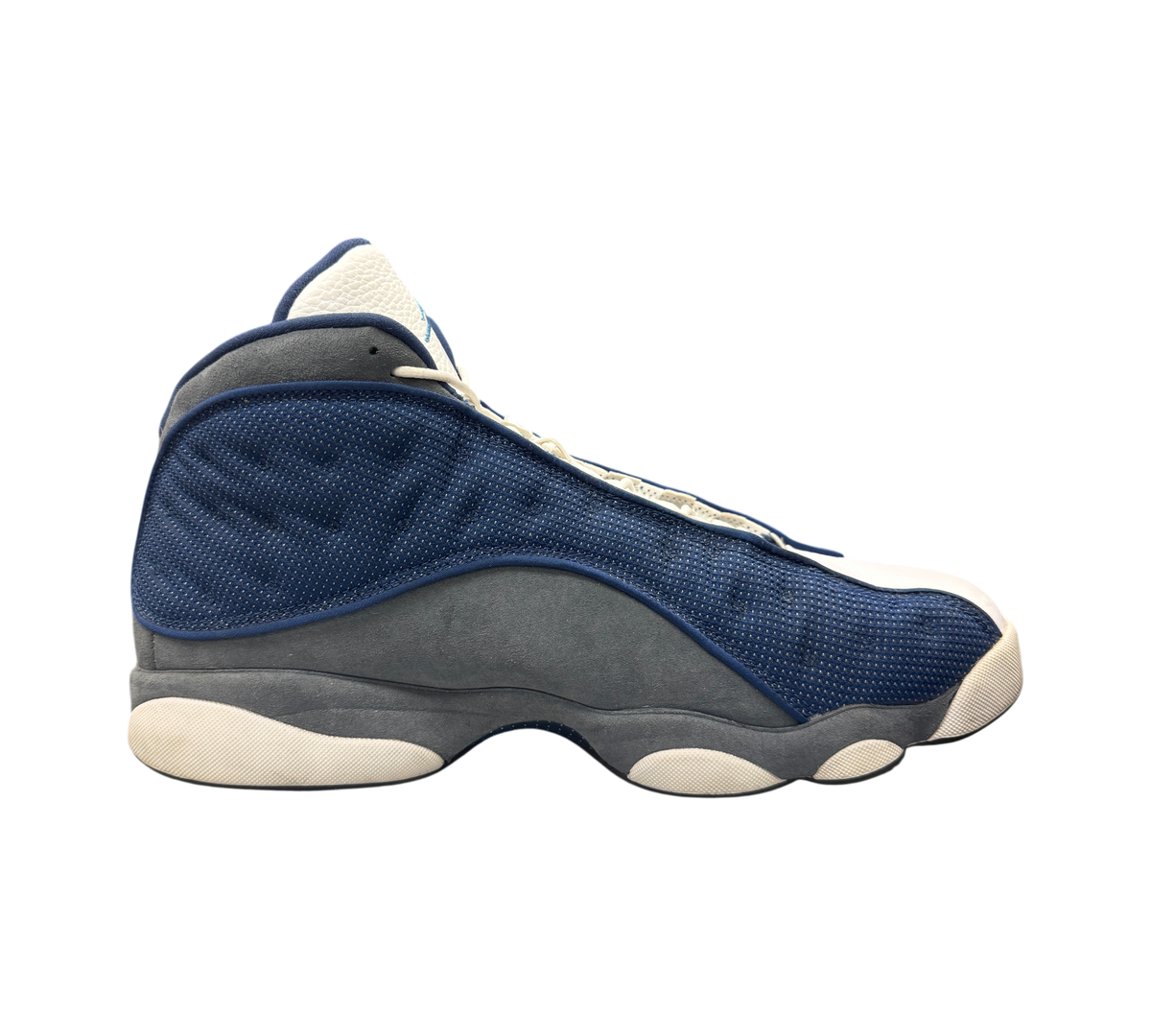 Genesis Boutique Jordan 13 Flint sneaker in navy blue and grey with white accents, side profile view
