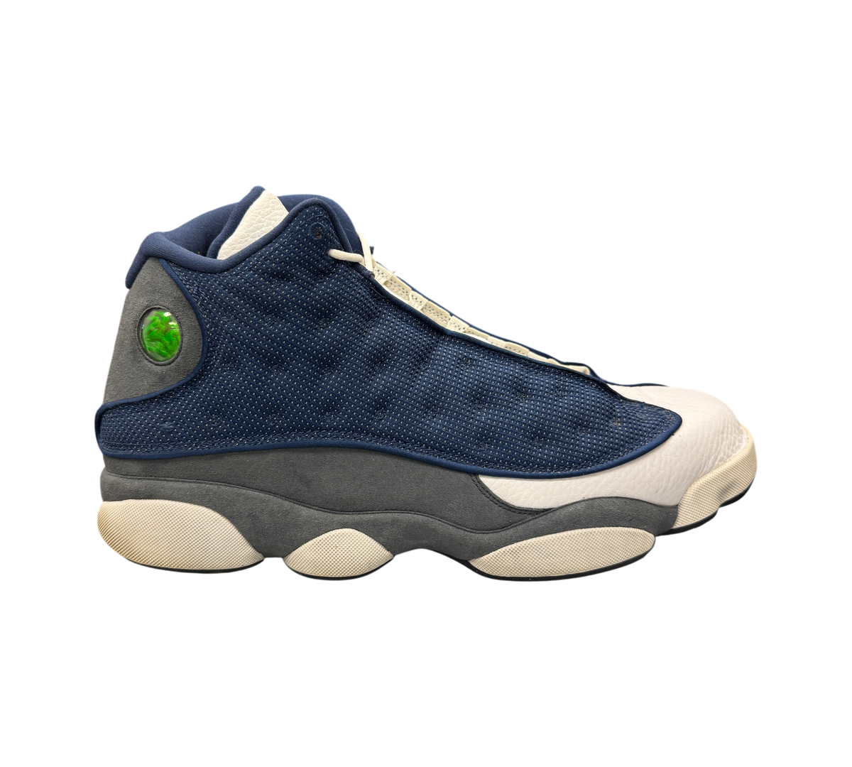 Genesis Boutique used Jordan 13 Flint sneakers in navy blue, grey, and white with signature holographic heel emblem.