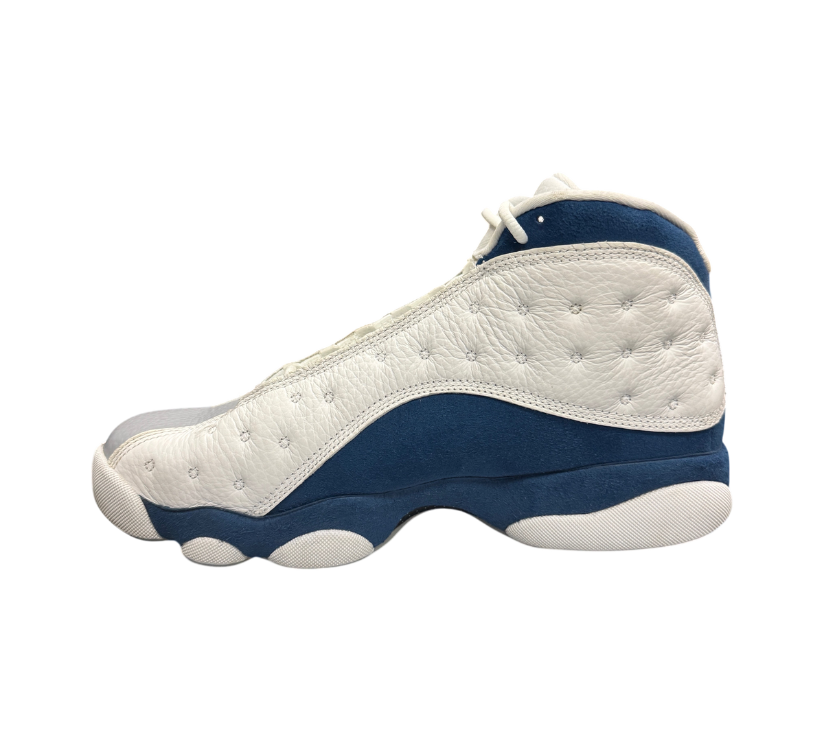 Genesis Boutique Jordan 13 French Blue sneakers in white and blue leather with signature quilted side panels
