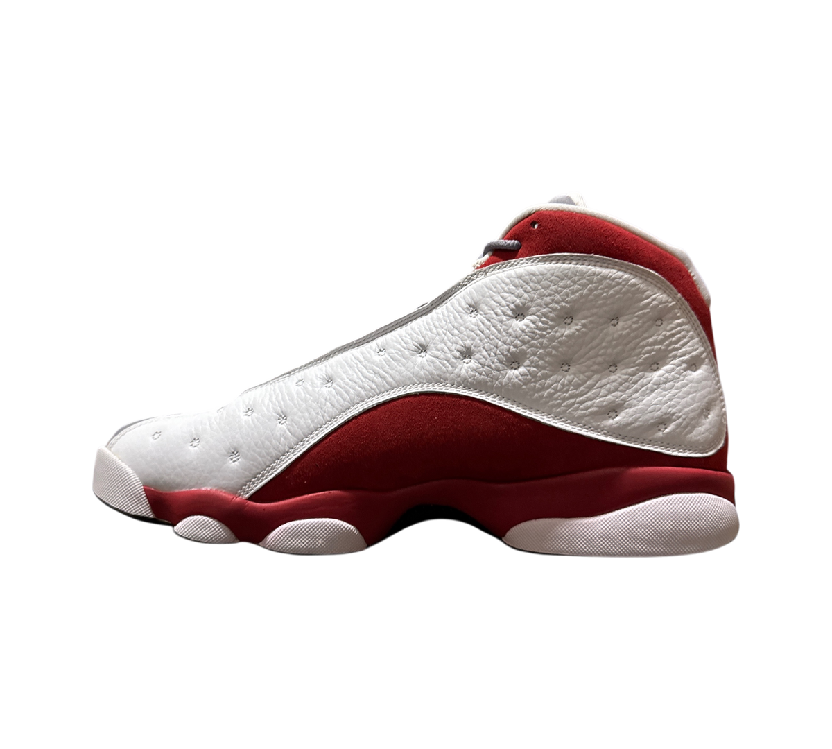 Genesis Boutique Jordan 13 Grey Toe sneakers featuring white tumbled leather and red suede side panels