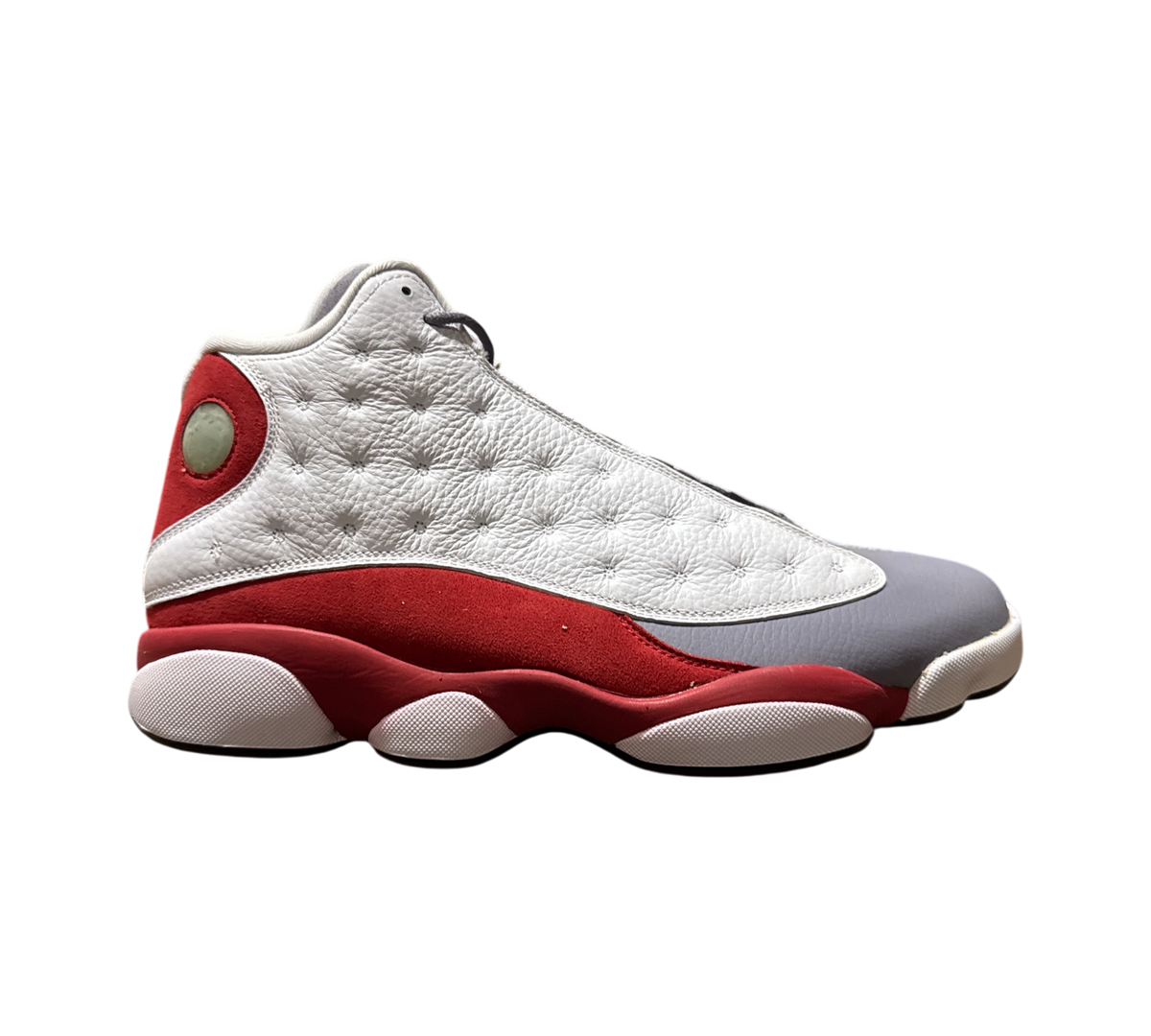 Genesis Boutique Jordan 13 Grey Toe sneakers featuring white tumbled leather, red suede, and a grey toe cap.