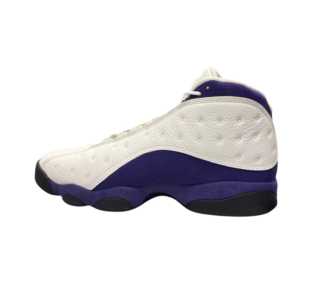 Genesis Boutique Jordan 13 Lakers sneakers in white leather and purple suede with black accents, side profile view.
