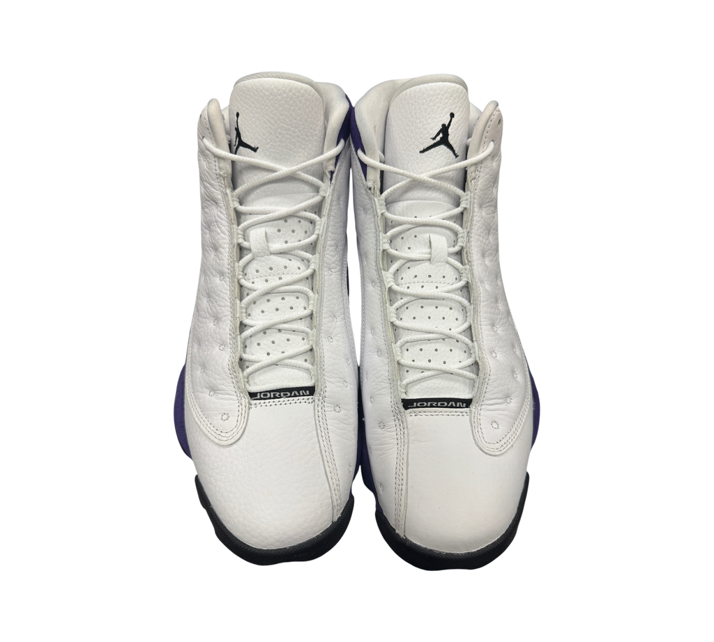 Genesis Boutique used Jordan 13 Lakers sneakers in white leather with purple accents and front view