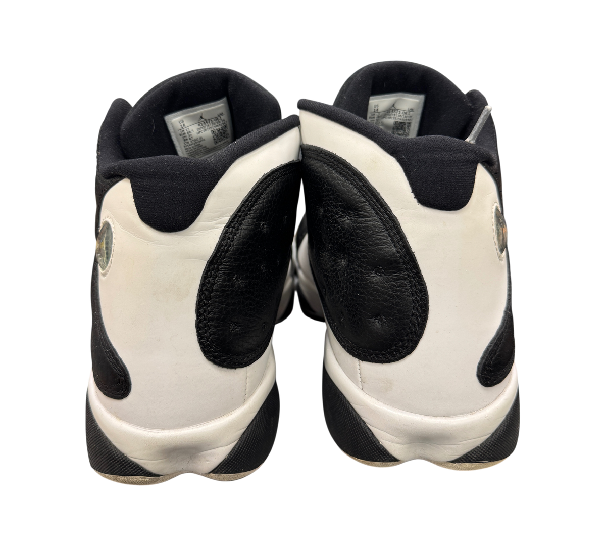 Genesis Boutique Jordan 13 Reverse He Got Game sneakers showing the black and white leather heel view