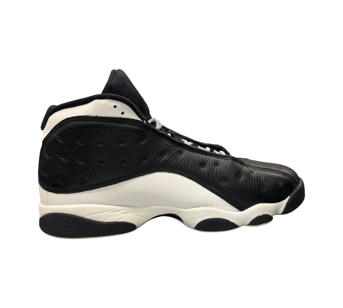 Genesis Boutique Jordan 13 Reverse He Got Game sneakers in black and white leather, side profile view.