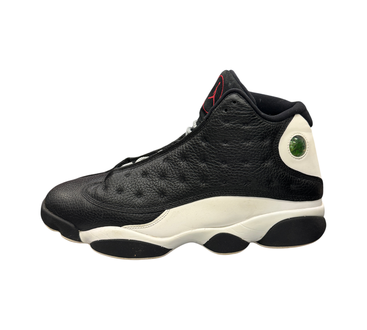 Genesis Boutique Jordan 13 Reverse He Got Game sneakers in black and white leather with signature holographic heel logo
