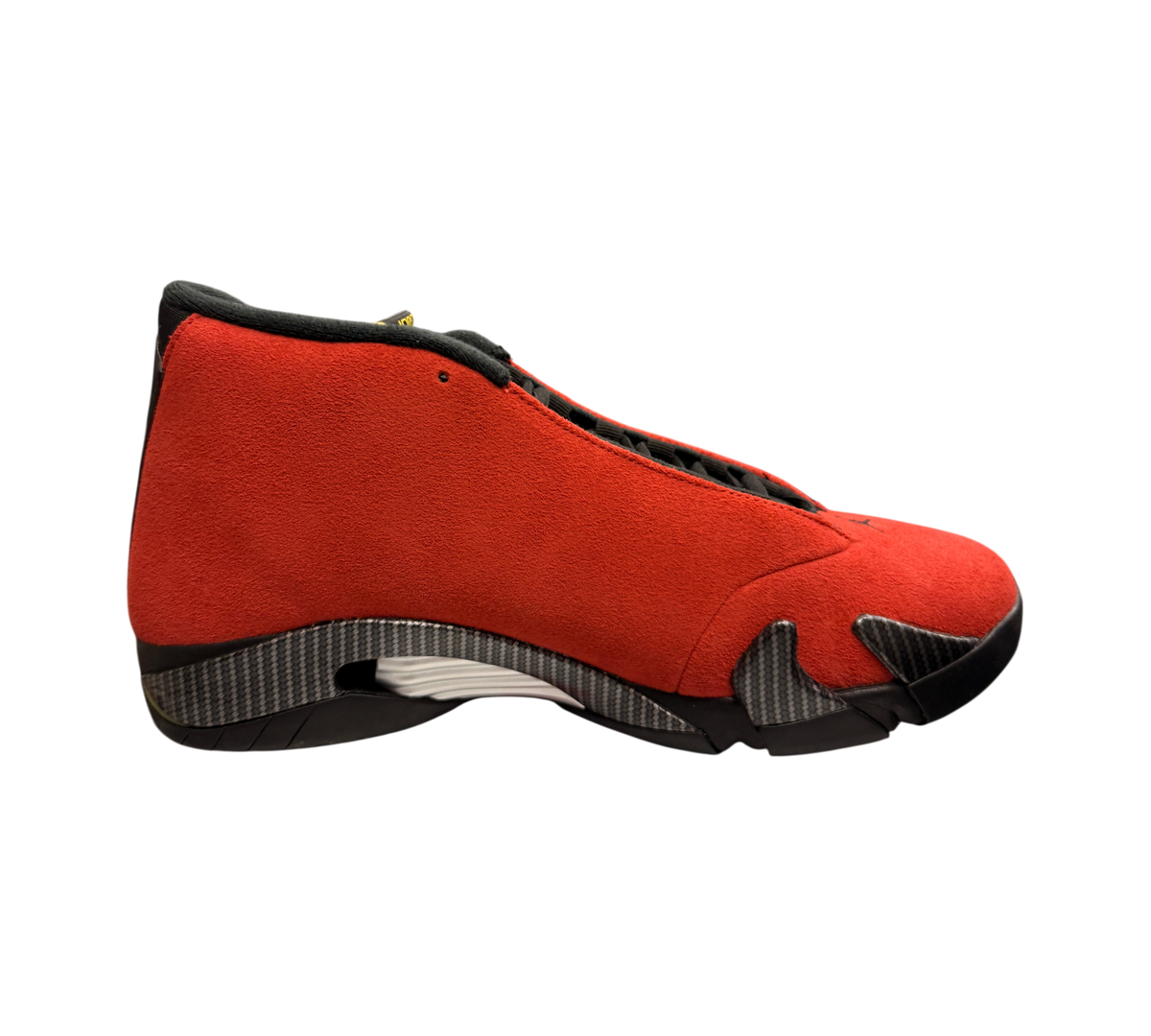 Genesis Boutique pre-owned Jordan 14 Ferrari sneakers in red suede with black carbon fiber detailing.