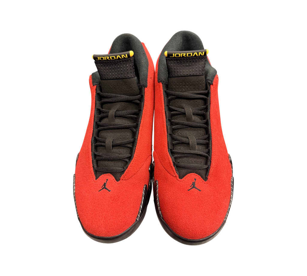 Genesis Boutique Jordan 14 Ferrari sneakers in red suede with black accents and yellow Jordan branding