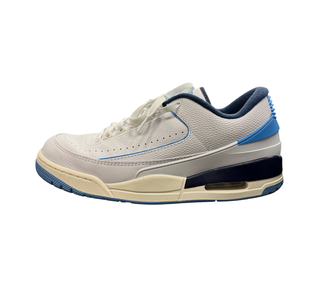 Genesis Boutique Jordan 2/3 UNC sneakers in white leather with university blue and navy accents, side profile view.
