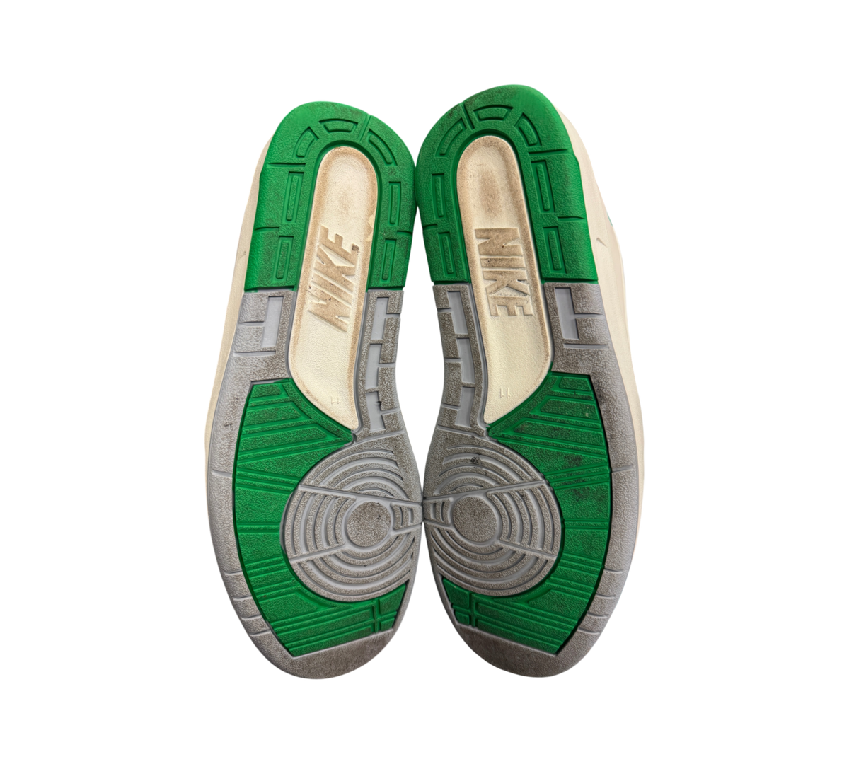 Genesis Boutique used Jordan 2 Lucky Green sneakers showing the green, grey, and white rubber outsoles