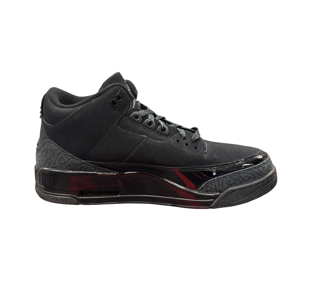 Genesis Boutique Jordan 3 Black Cat sneakers in all-black nubuck with signature elephant print and glossy accents.
