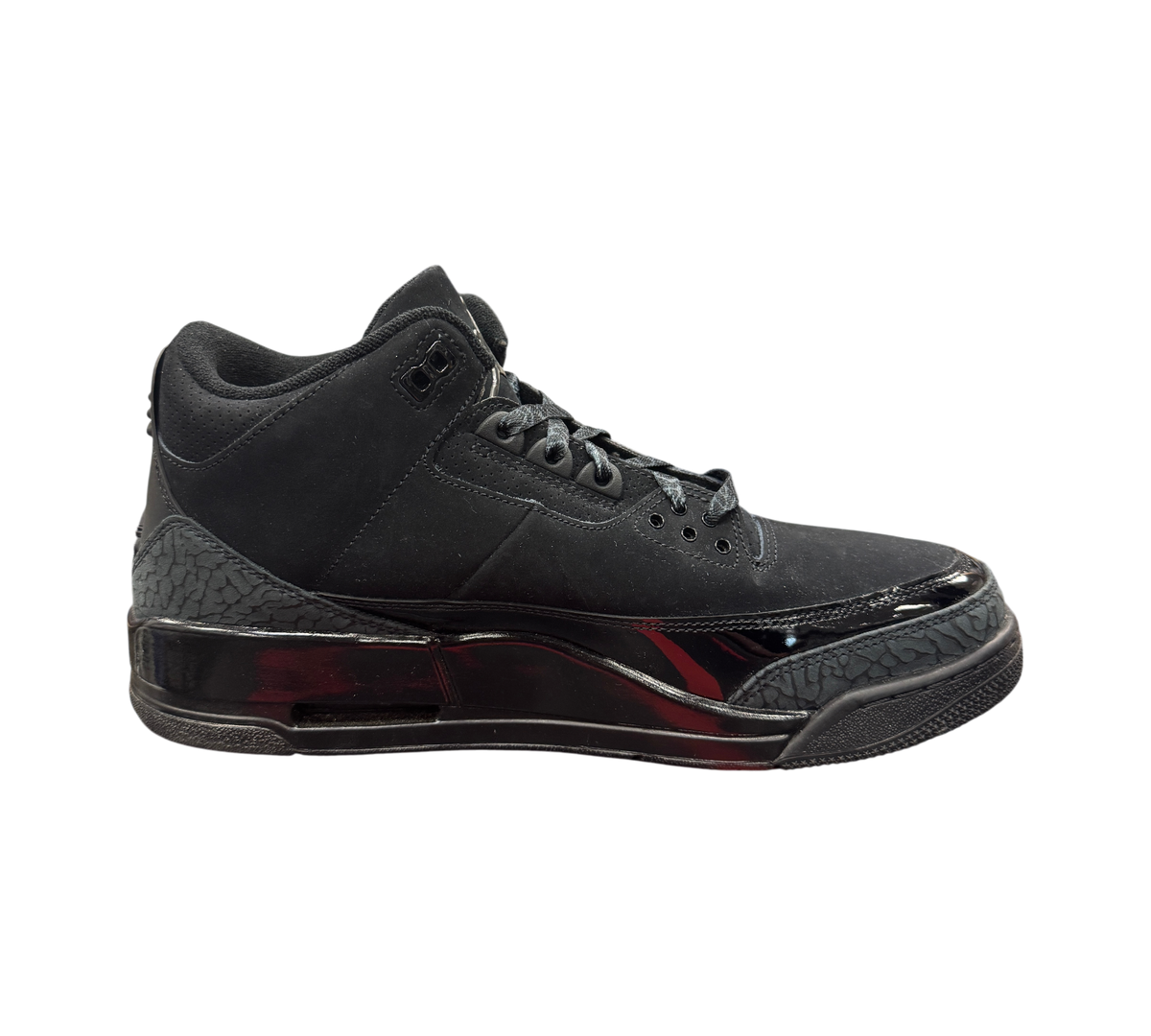 Genesis Boutique Jordan 3 Black Cat sneakers in all-black nubuck with signature elephant print and glossy accents.