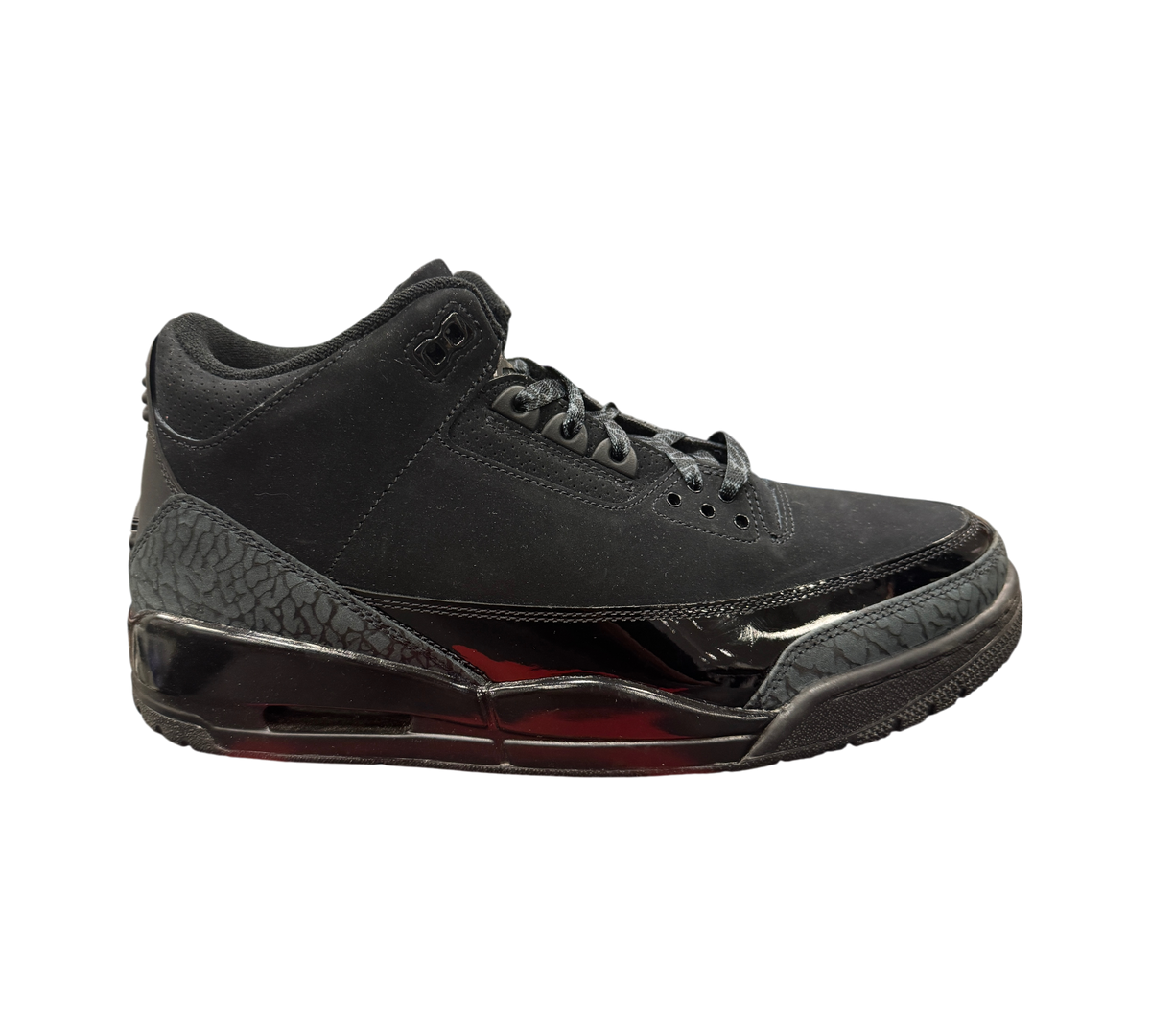 Genesis Boutique Jordan 3 Black Cat sneaker in all-black nubuck and patent leather with iconic elephant print detail.