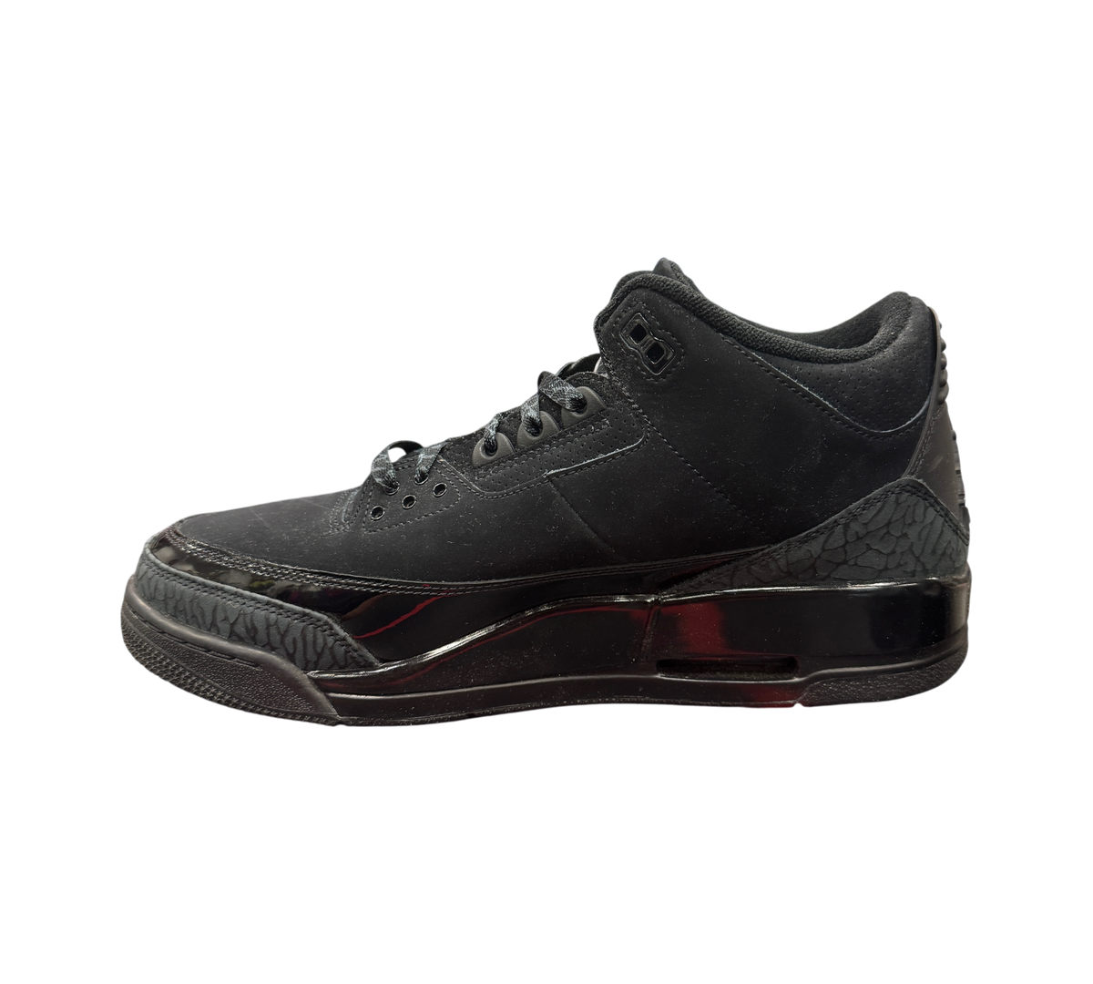 Genesis Boutique Jordan 3 Black Cat sneaker in all-black nubuck with signature elephant print and glossy midsole