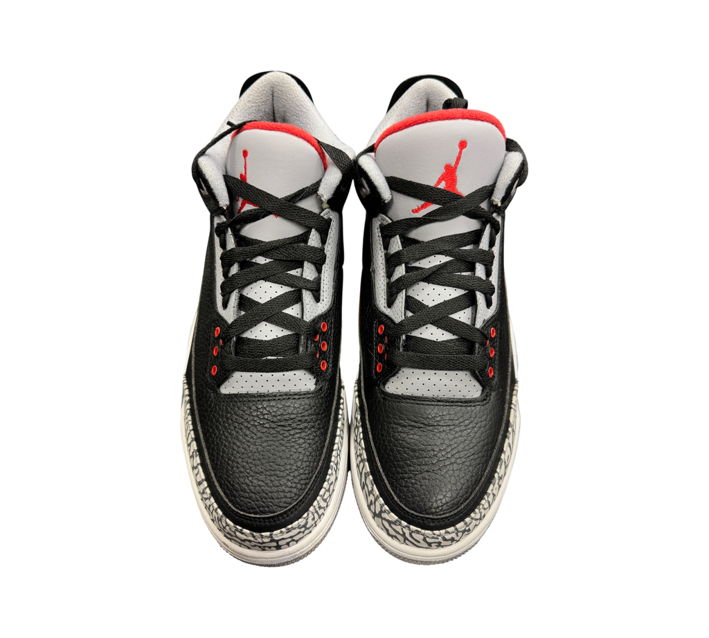 Genesis Boutique pre-owned Jordan 3 2018 Black Cement sneakers featuring iconic elephant print and red Jumpman logo.