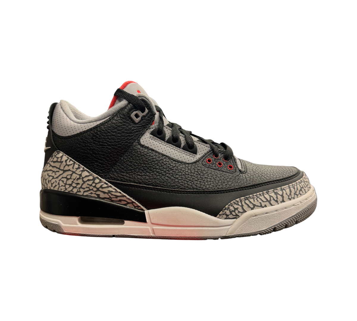 Genesis Boutique Jordan 3 2018 Black Cement sneakers featuring black tumbled leather and iconic grey elephant print.