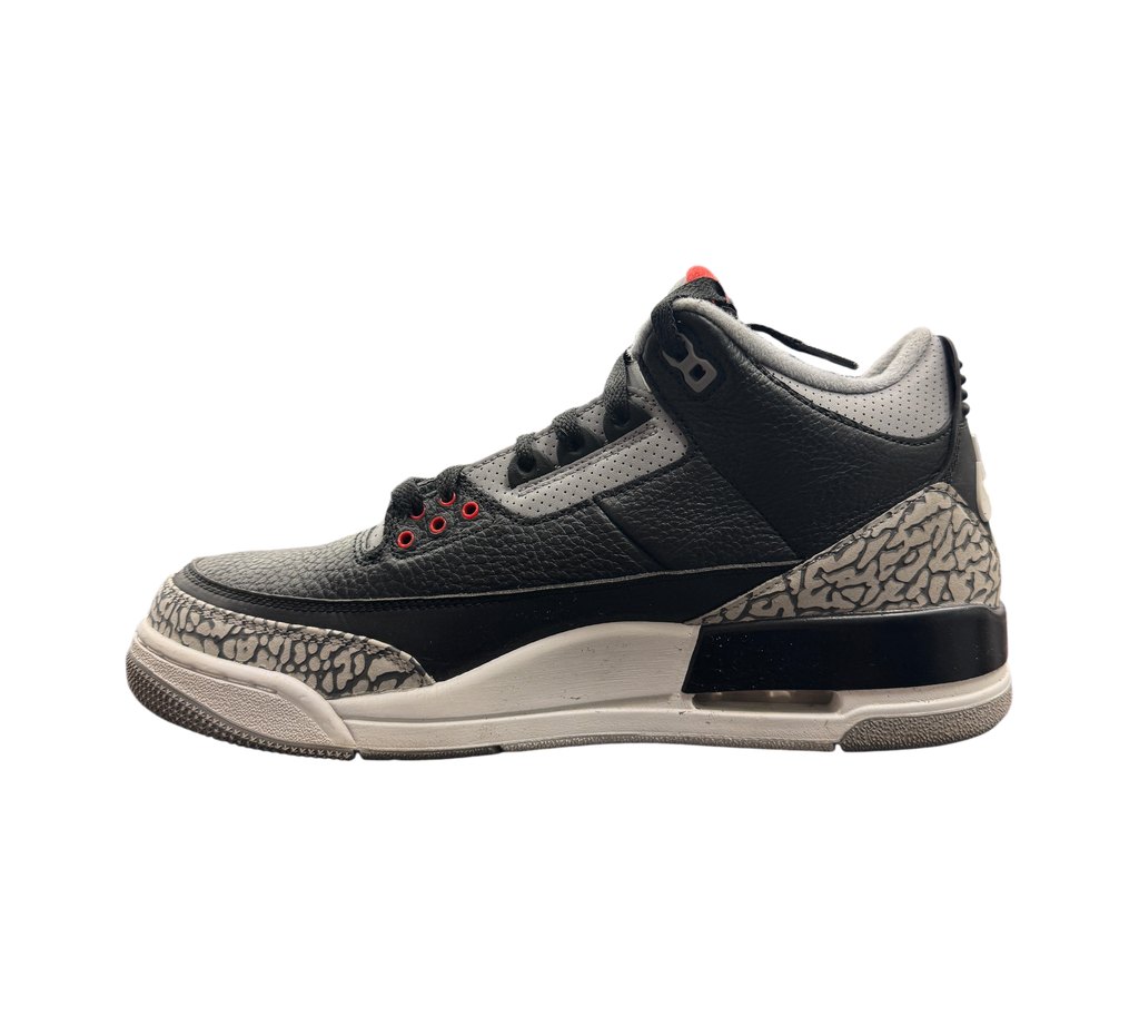 Genesis Boutique Jordan 3 2018 Black Cement sneakers featuring iconic elephant print and red eyelet details.
