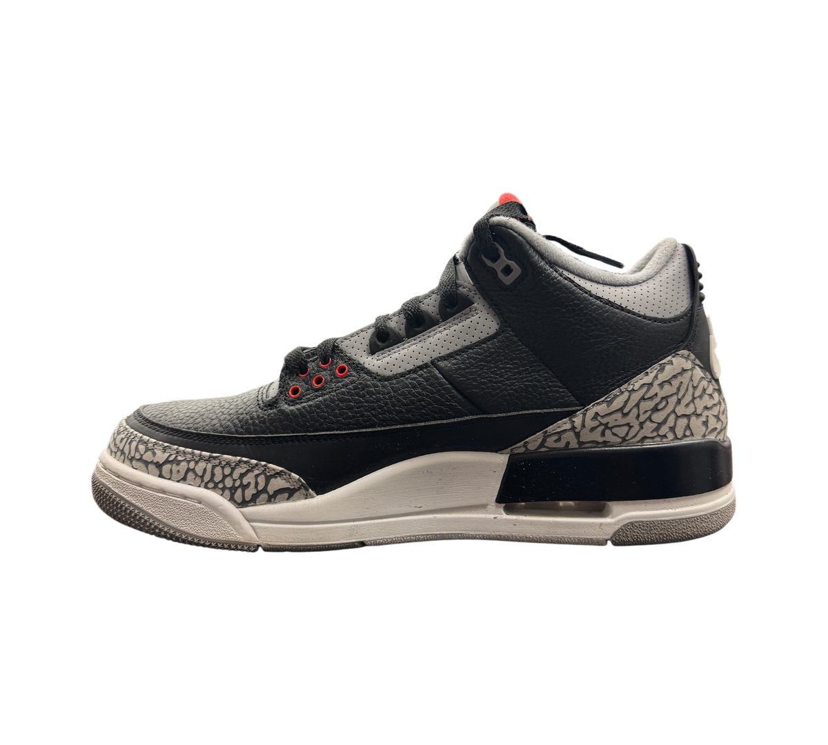 Genesis Boutique Jordan 3 2018 Black Cement sneakers featuring iconic elephant print and red eyelet details.