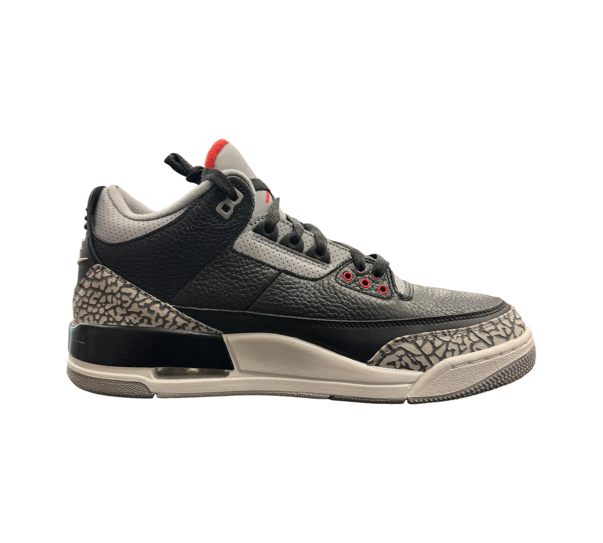 Genesis Boutique Jordan 3 2018 Black Cement sneakers with iconic elephant print and red accents on a branded box