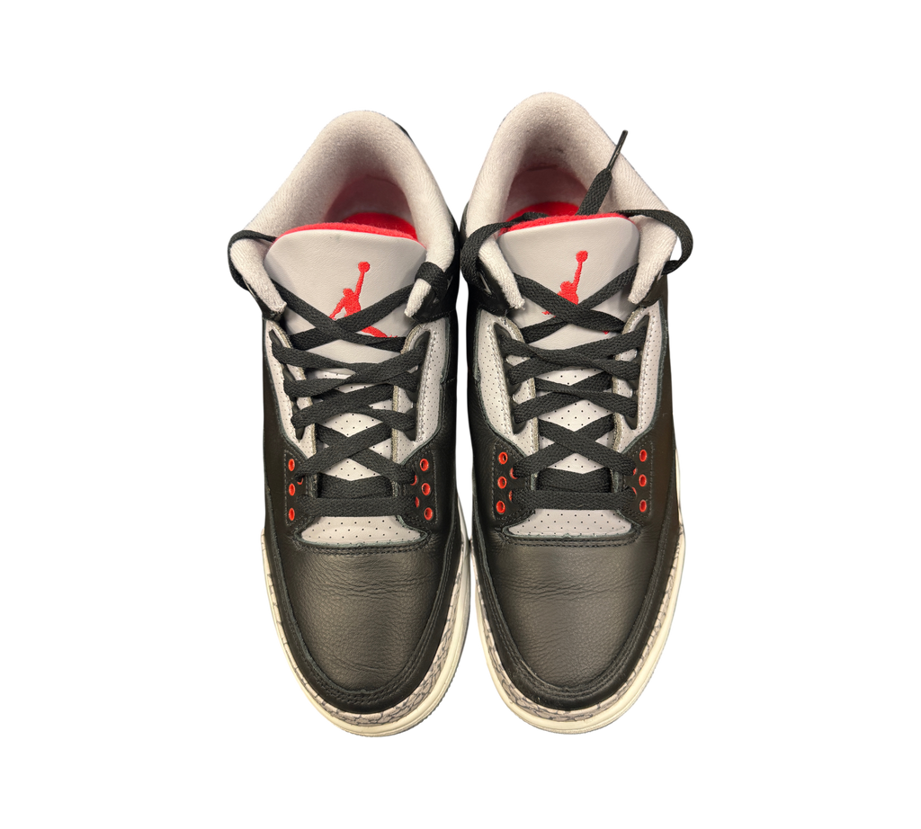 Genesis Boutique Jordan 3 Black Cement sneakers featuring black leather, grey accents, and red Jumpman logo details.