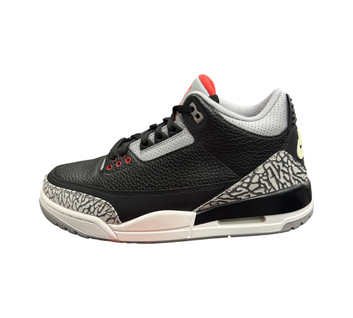 Genesis Boutique Jordan 3 2018 Black Cement sneakers featuring black leather, grey elephant print, and red accents.