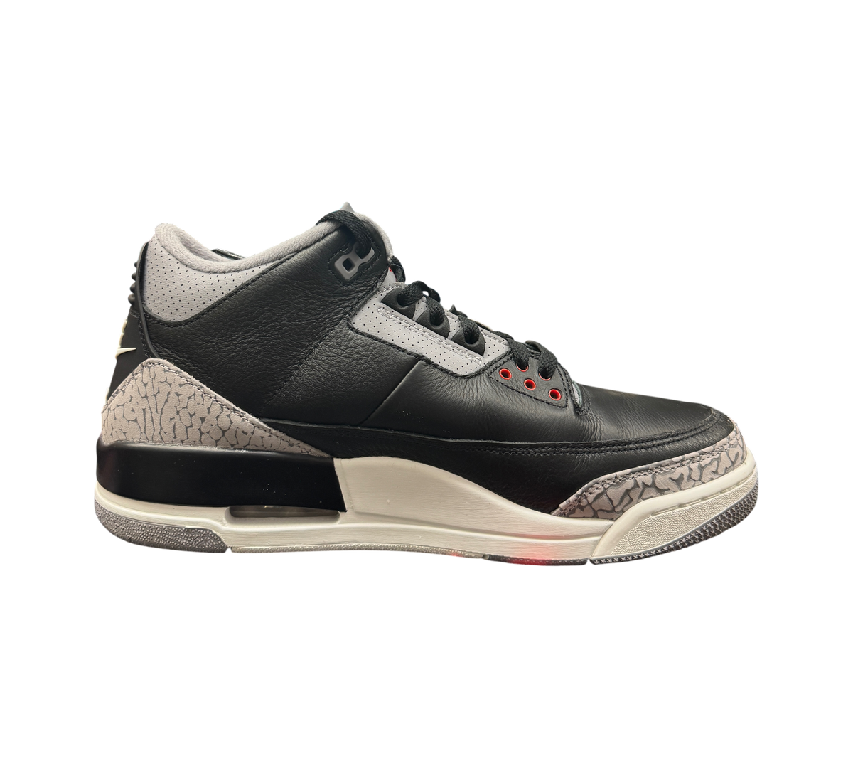 Genesis Boutique Jordan 3 Black Cement sneakers featuring iconic elephant print overlays and black leather upper