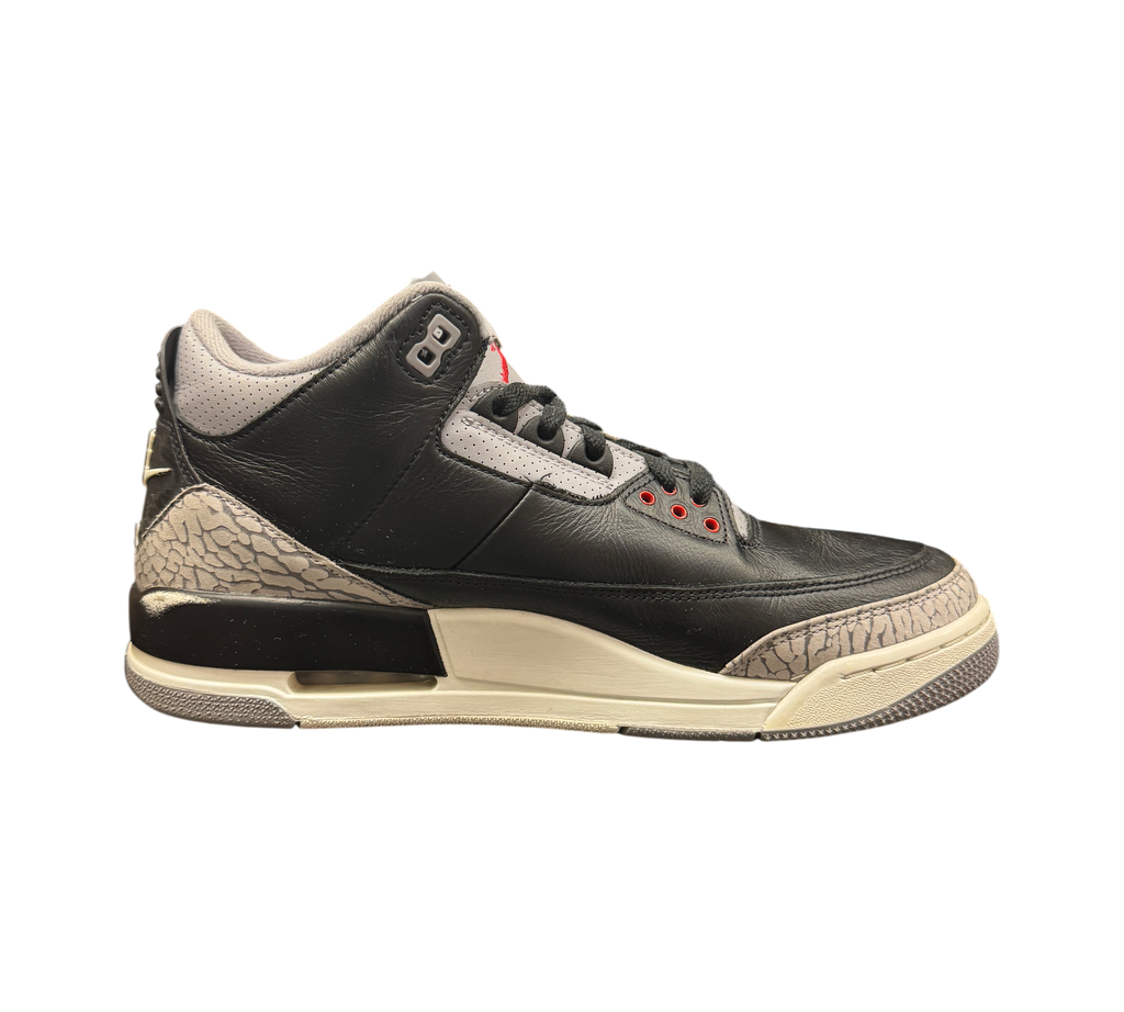 Genesis Boutique Jordan 3 Black Cement sneakers featuring black leather, grey elephant print, and red accents.