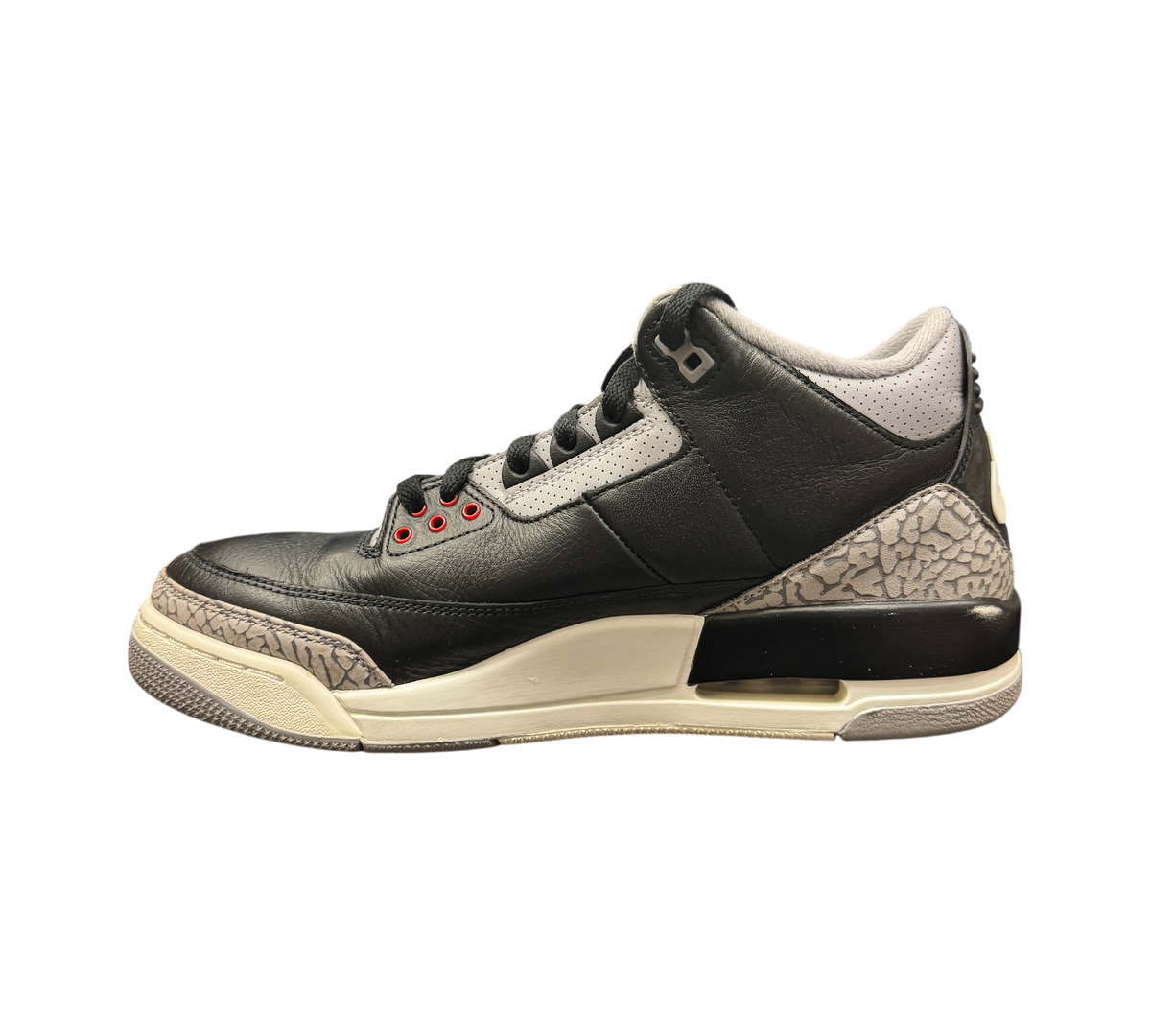 Genesis Boutique Jordan 3 Black Cement sneakers in black leather with iconic grey elephant print and red eyelets.