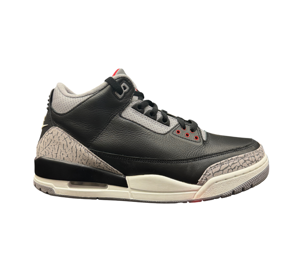 Genesis Boutique Jordan 3 Black Cement sneakers featuring black leather upper and iconic grey elephant print overlays
