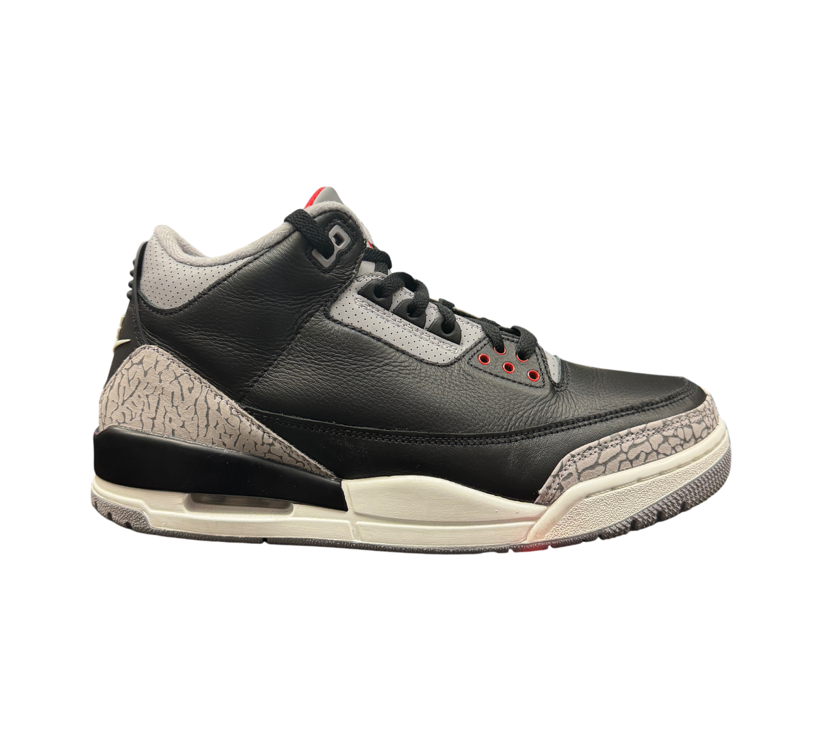 Genesis Boutique Jordan 3 Black Cement sneakers featuring black leather upper and iconic grey elephant print overlays