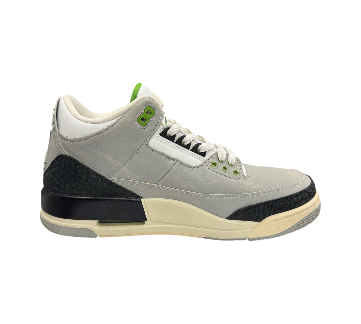 Genesis Boutique used Jordan 3 Chlorophyll sneakers in grey suede with black elephant print and green accents.
