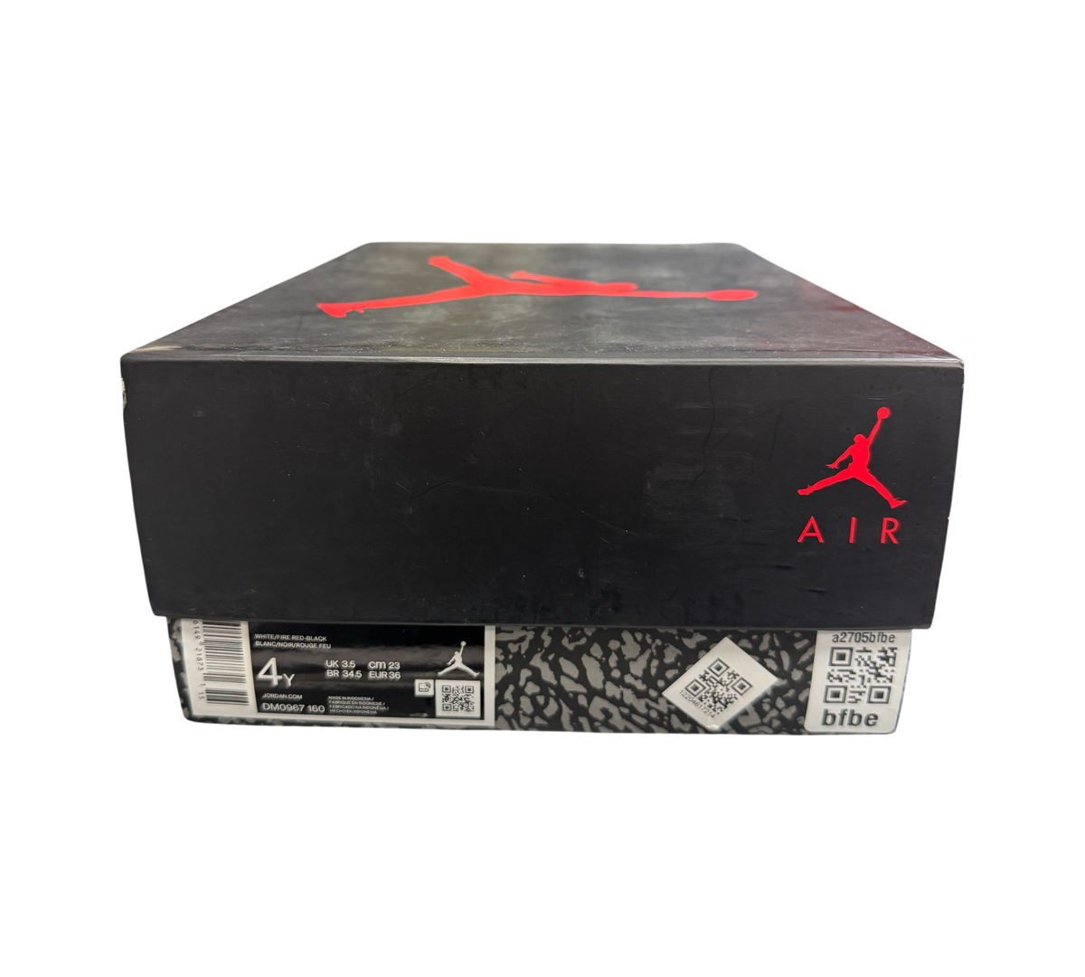 Genesis Boutique Jordan 3 GS Fire Red shoe box with black lid, red Jumpman logo, and iconic elephant print base.