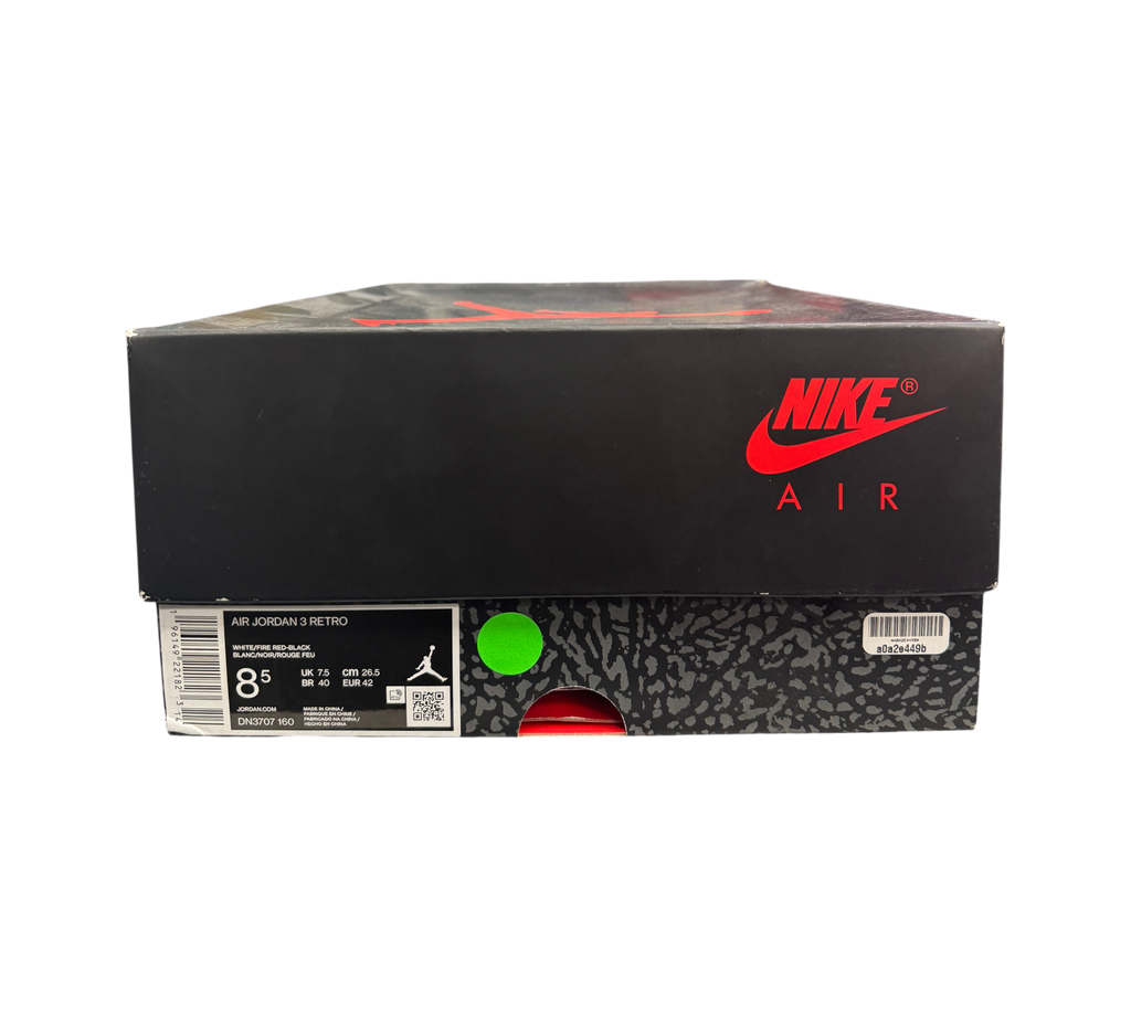 Genesis Boutique Jordan 3 Fire Red sneaker box with Nike Air branding and size label in a retail store setting