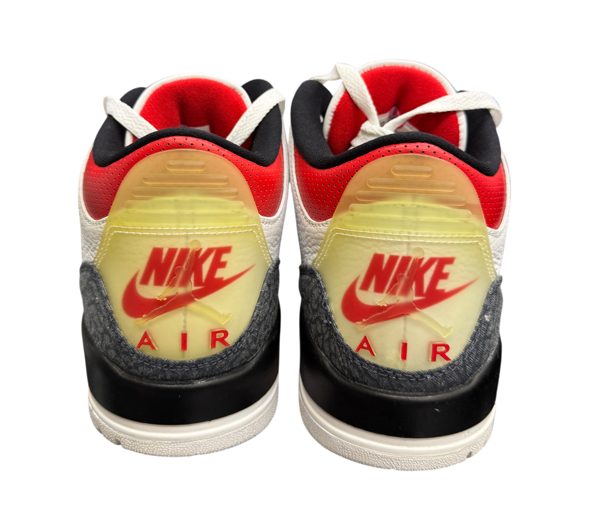 Genesis Boutique used Jordan 3 Fire Red Denim sneakers featuring translucent heel tabs with Nike Air branding.