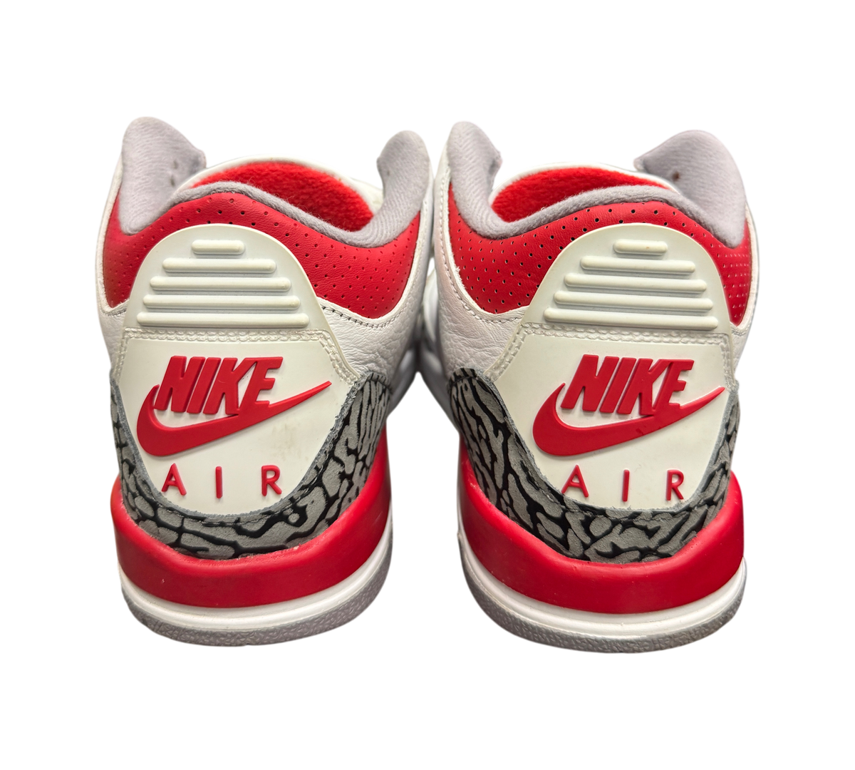 Genesis Boutique used Jordan 3 GS Fire Red sneakers showing the iconic elephant print heel and red Nike Air branding.
