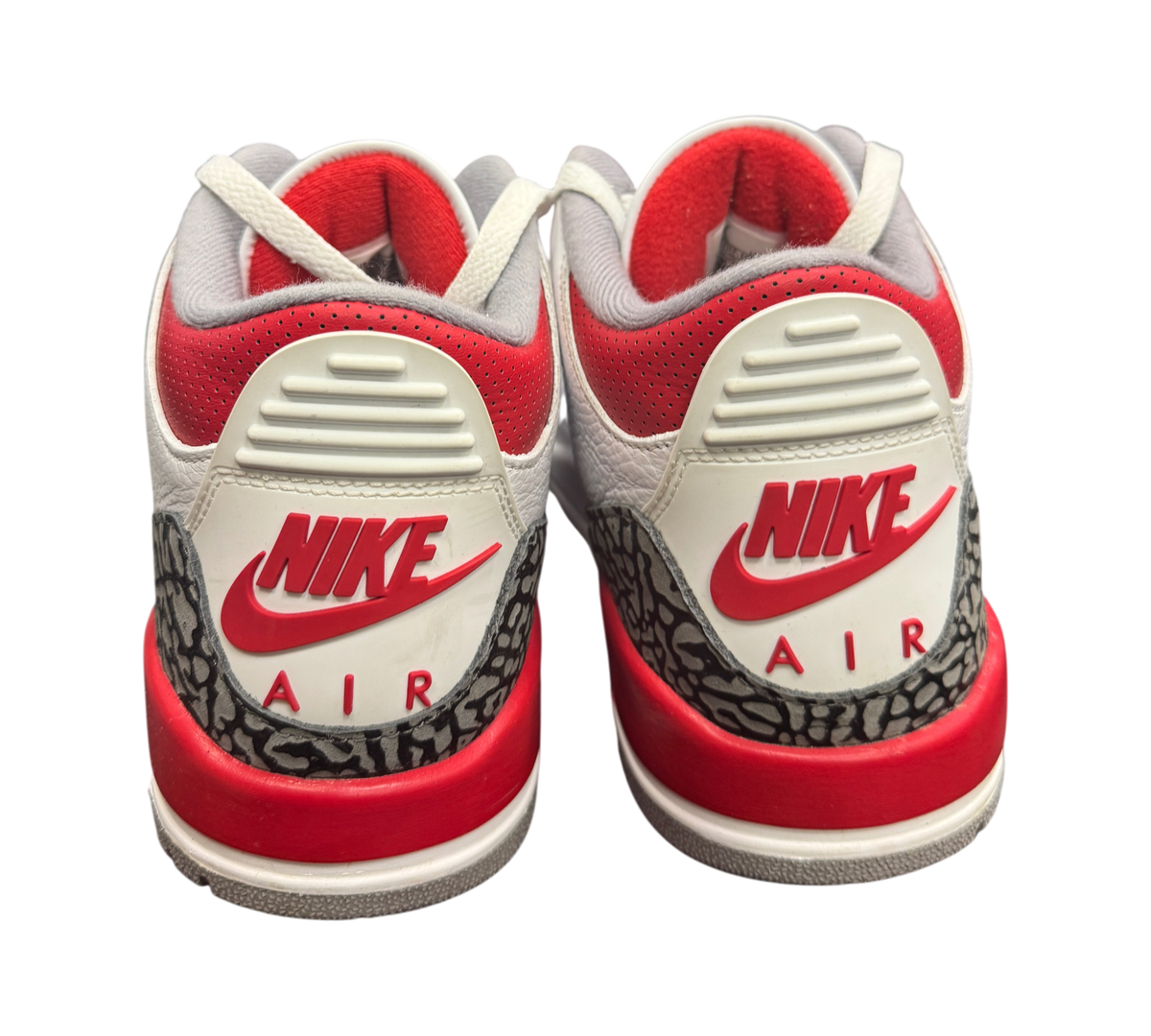 Genesis Boutique Jordan 3 Fire Red sneakers showing the white leather heel, red Nike Air branding, and elephant print