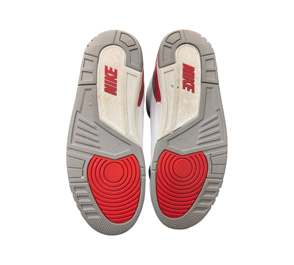 Genesis Boutique pre-owned Jordan 3 Fire Red sneakers showing grey and red rubber outsoles with Nike branding.