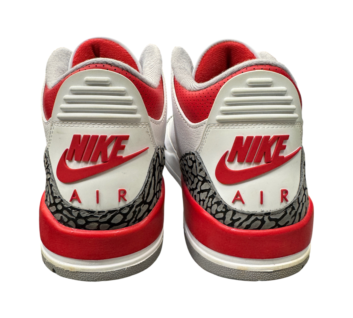 Genesis Boutique pre-owned Jordan 3 Fire Red sneakers featuring iconic elephant print and Nike Air branding on heels.