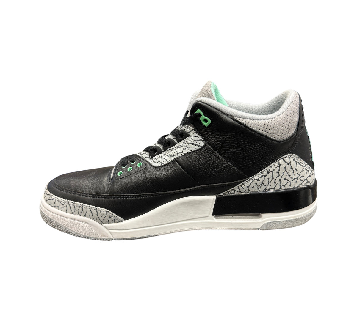 Genesis Boutique Jordan 3 Green Glow sneakers in black leather with iconic grey elephant print and mint green accents.