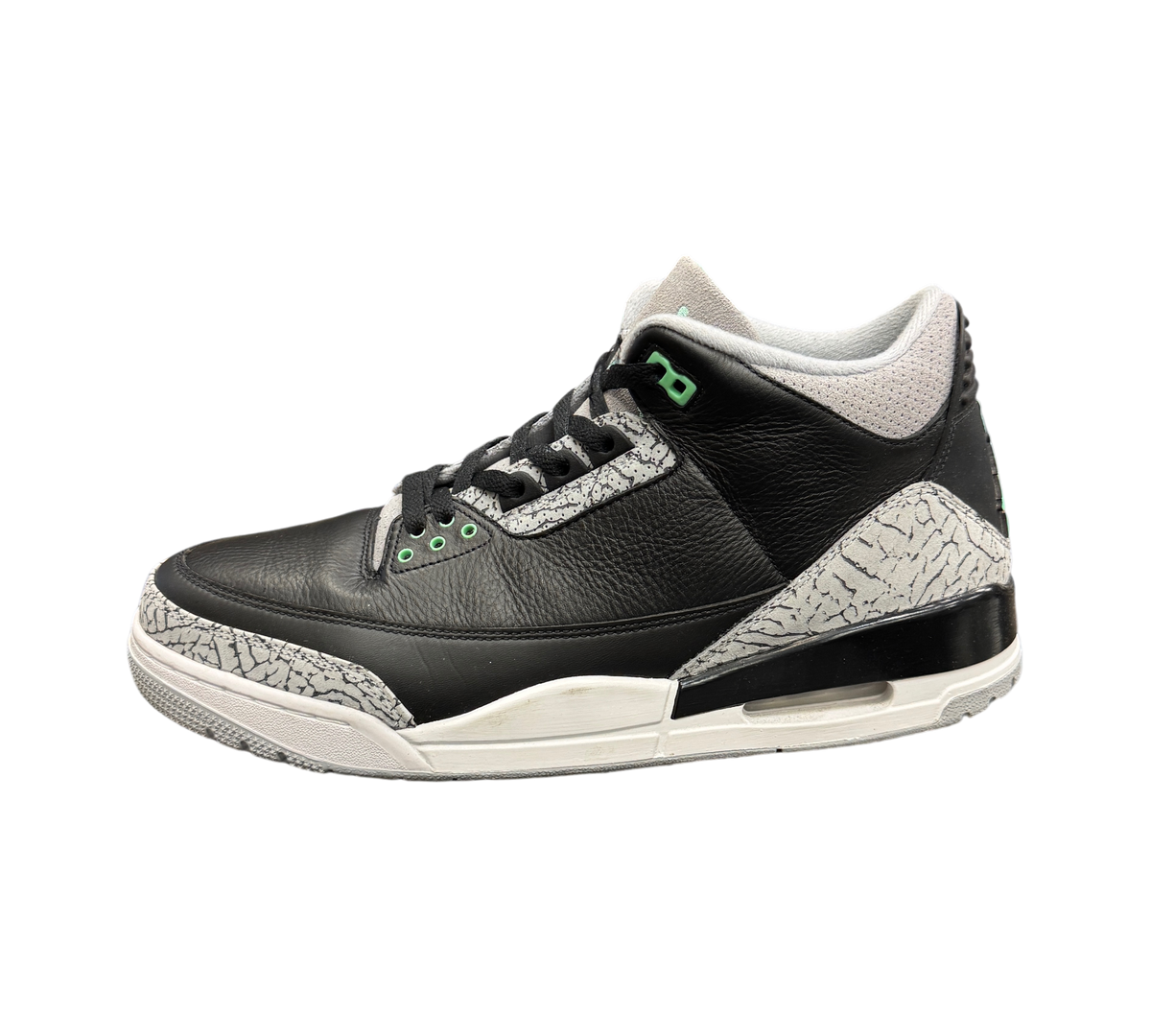 Genesis Boutique Jordan 3 Green Glow sneakers in black leather with iconic grey elephant print and mint green accents.