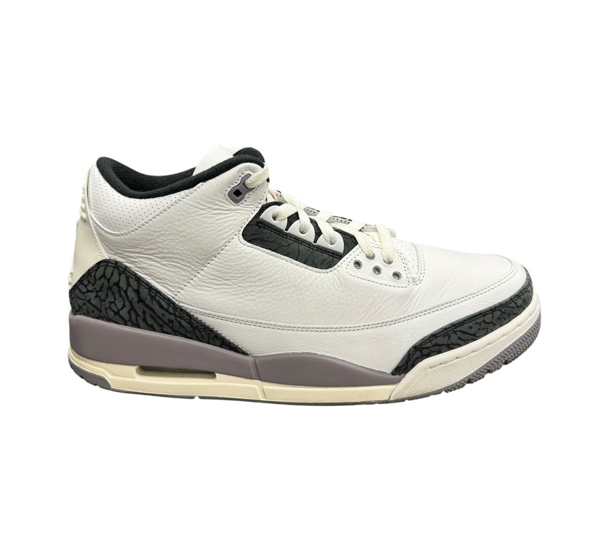Genesis Boutique Jordan 3 Grey Cement sneakers in white leather with iconic grey elephant print and black accents.