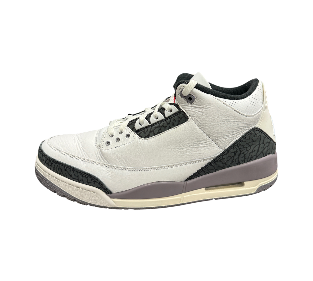 Genesis Boutique Jordan 3 Grey Cement sneakers in white leather with iconic elephant print overlays and grey midsole.