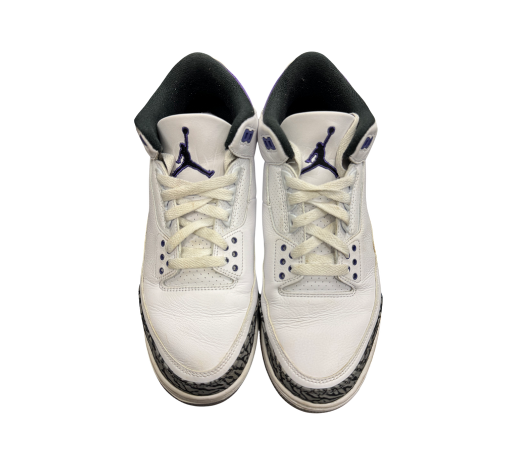 Genesis Boutique Jordan 3 "Iris" sneakers with white leather, purple accents, and elephant print trim. Lace-up closure.