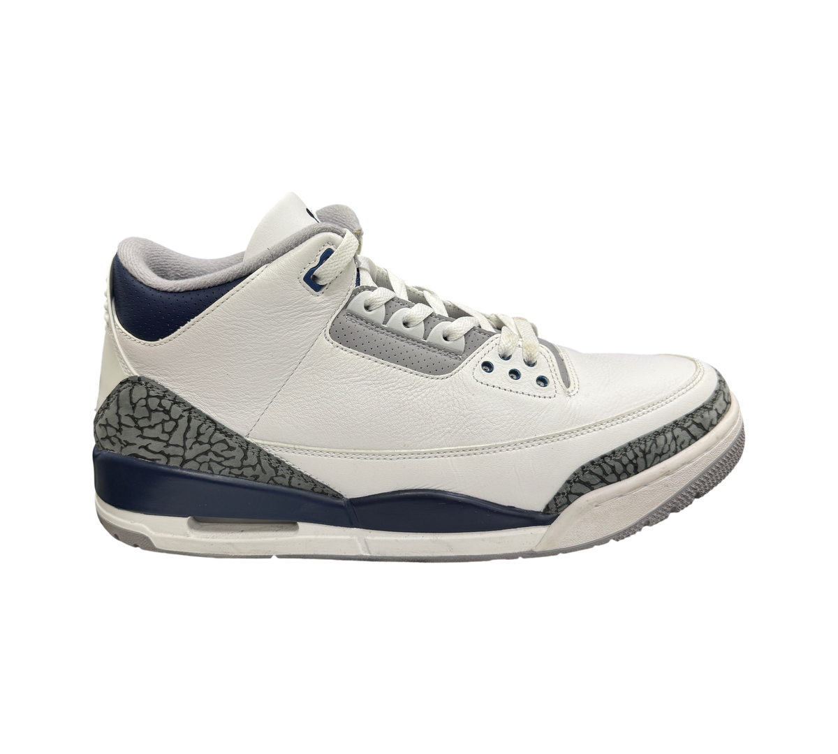 Genesis Boutique Jordan 3 Midnight Navy sneakers featuring white leather, grey elephant print, and navy accents.
