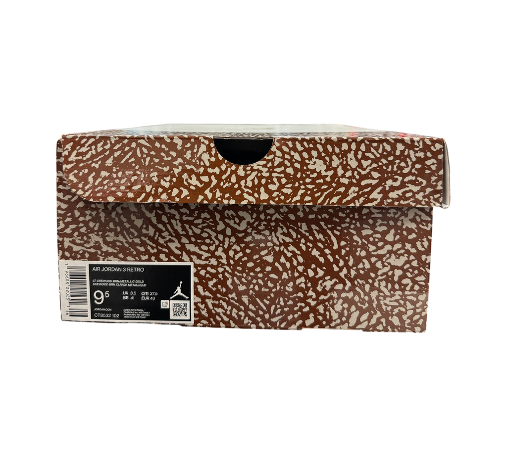 Genesis Boutique Jordan 3 Palomino shoe box with brown and white elephant print pattern on a store shelf