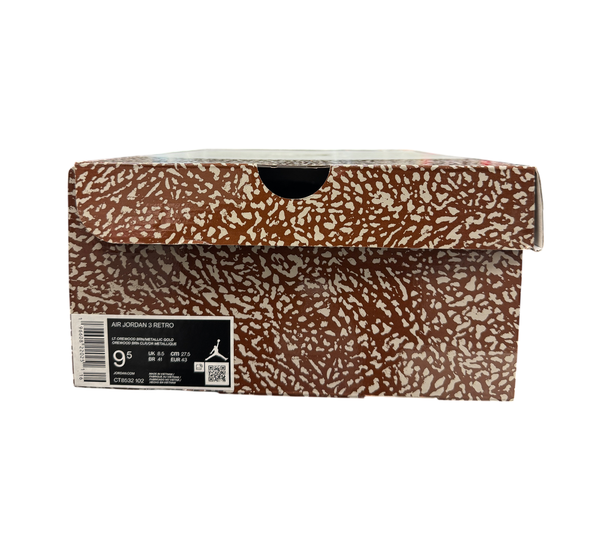 Genesis Boutique Jordan 3 Palomino shoe box with brown and white elephant print pattern on a store shelf