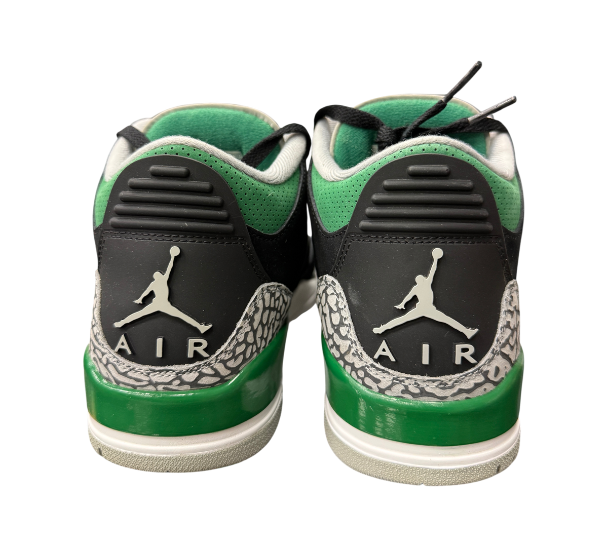 Genesis Boutique Air Jordan 3 Pine Green sneakers showing the black and grey elephant print heels with Jumpman logos