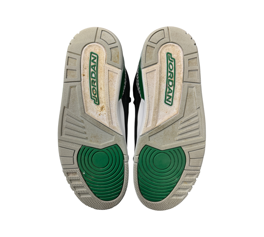Genesis Boutique used Air Jordan 3 Pine Green sneakers showing the green and grey rubber outsoles from below