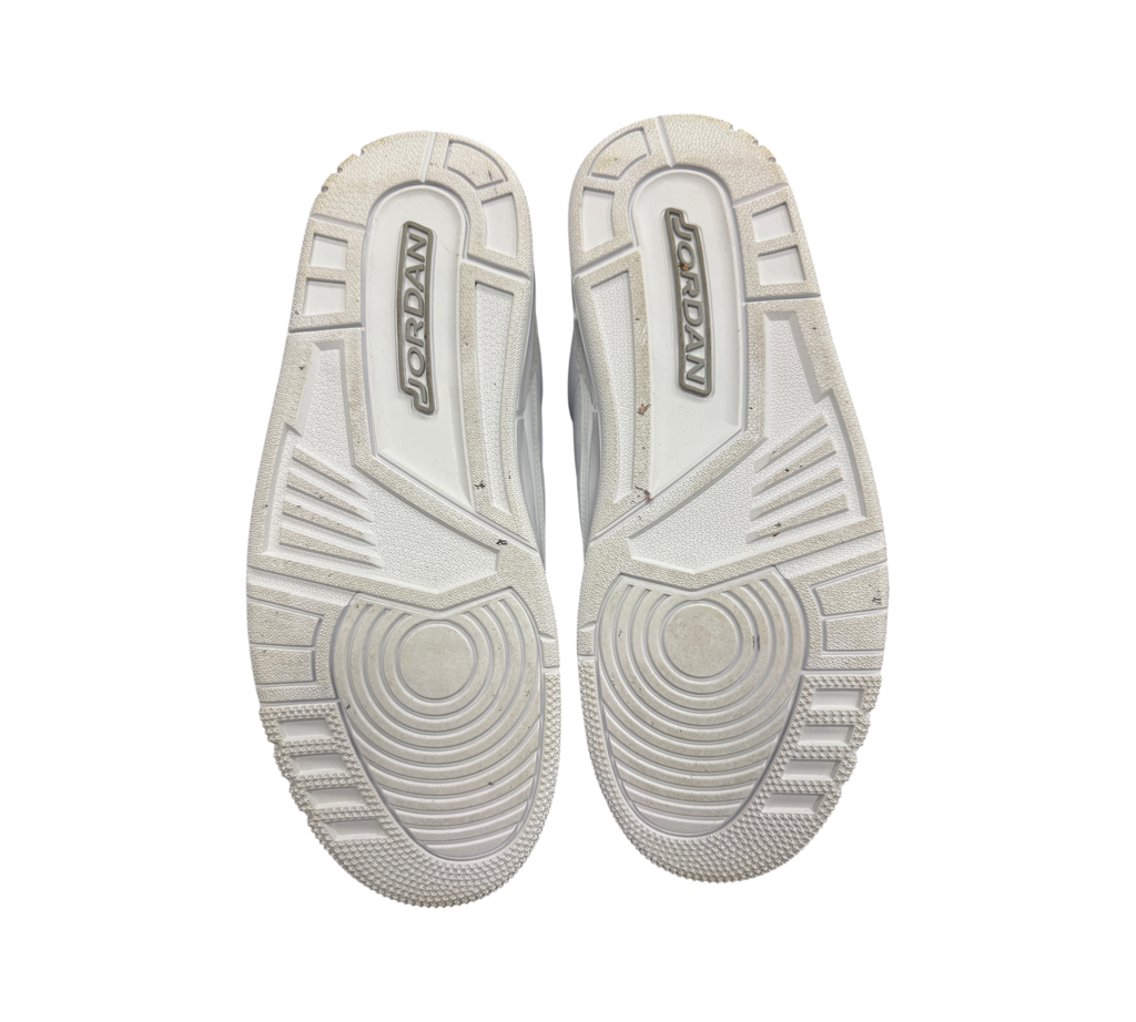 Genesis Boutique Jordan 3 Pure Money sneakers showing the white rubber outsoles with Jordan branding